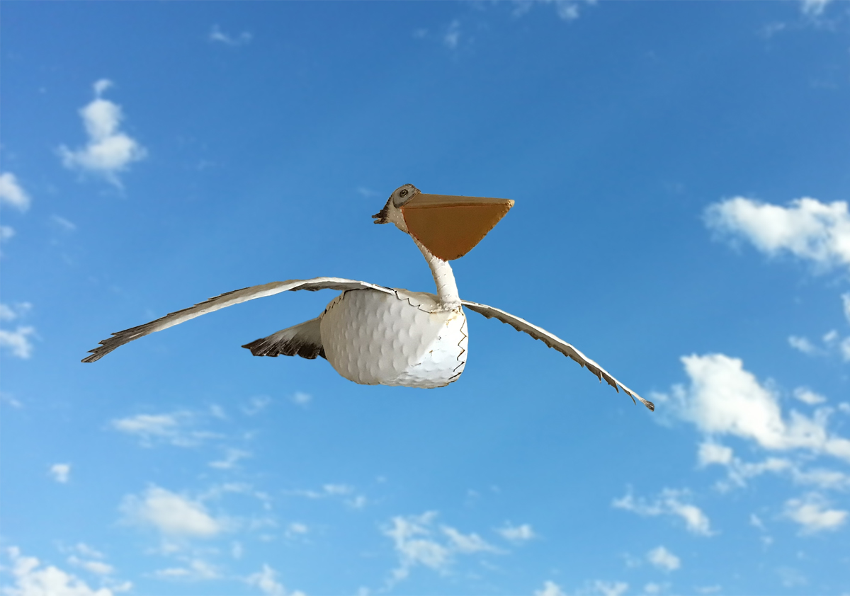 Metal Flying Pelican Sculpture - Chris Stoten